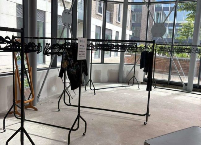 Empty clothes rails taken at the set up of St Albans Clothes Swap supporting Susfest and Greenpeace