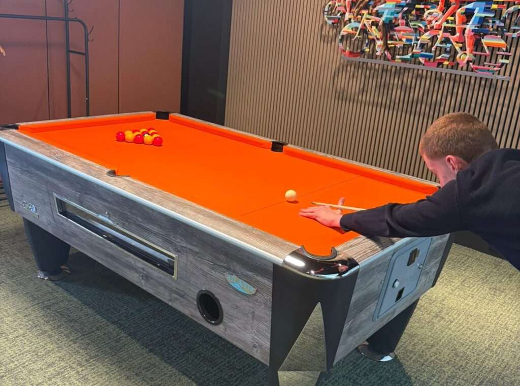 Team building at Twenty-Two playing pool