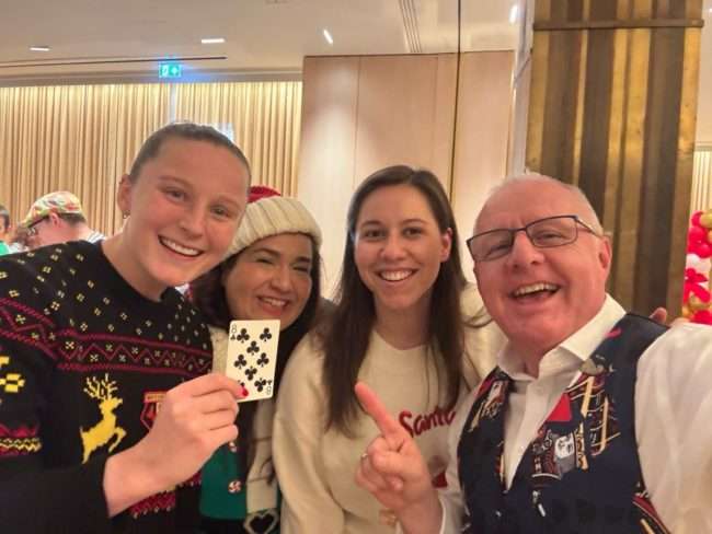 Watford FC footballer Anna Filbey, Carina, Rachel from Twenty-Two and magician Peter Barker at the Watford Hospital's Children's Starfish Ward Christmas party